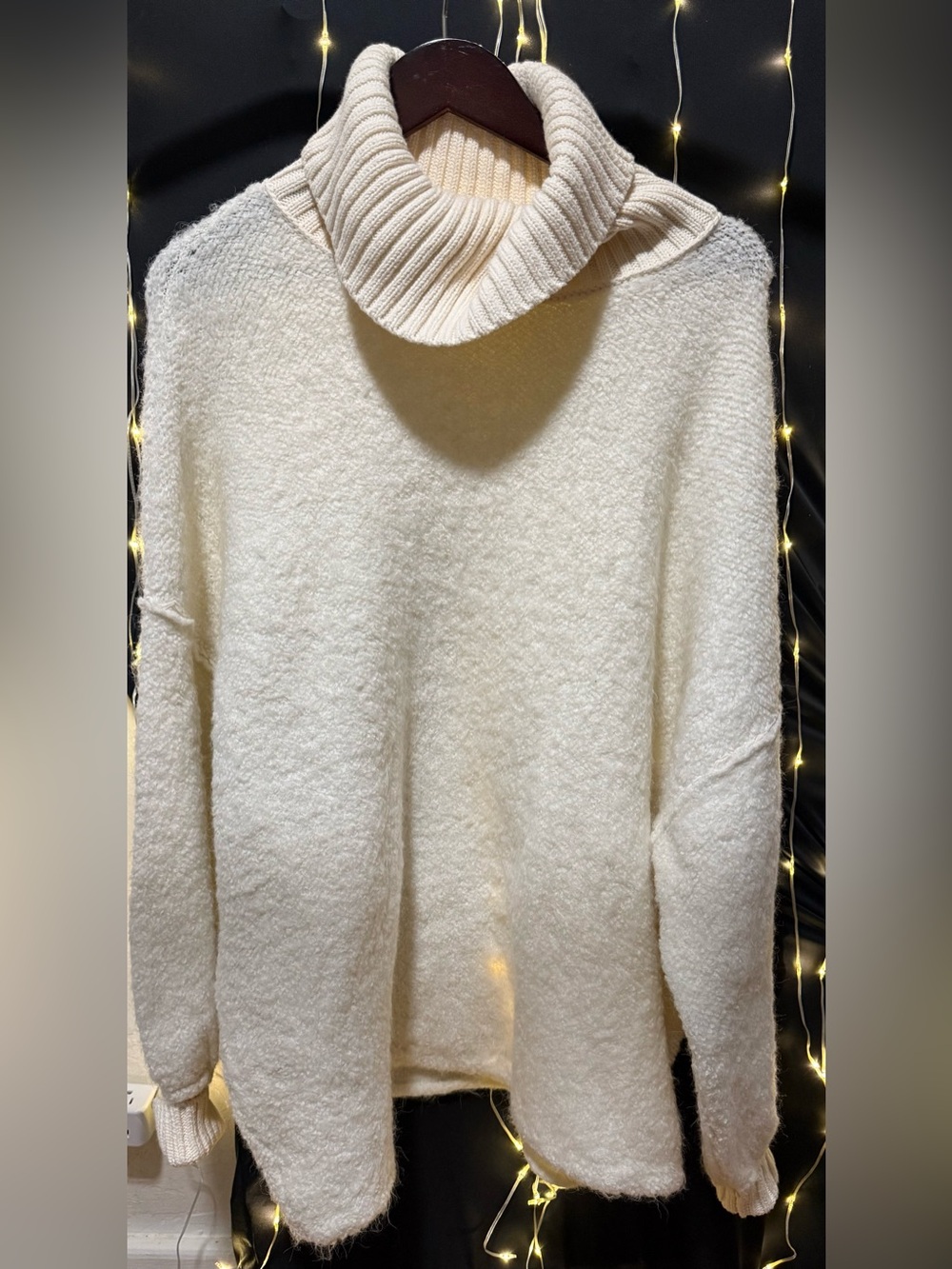 39.Pre loved Free People Cream Turtleneck Sweater